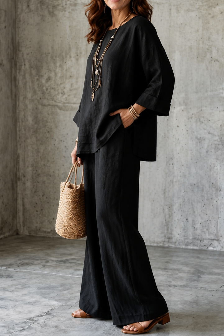 Snygg outfit med vida ben och topp i minimalistisk stil