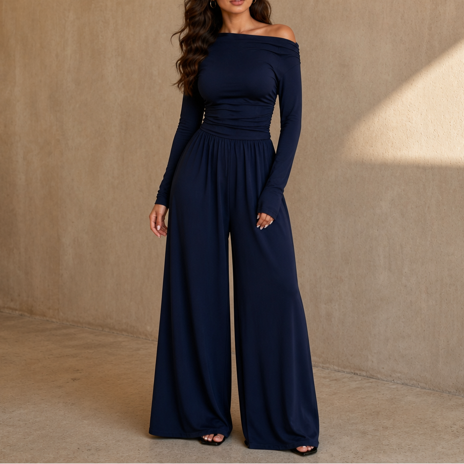 Detalj av ärmlös off-shoulder snitt på damernas partyjumpsuit