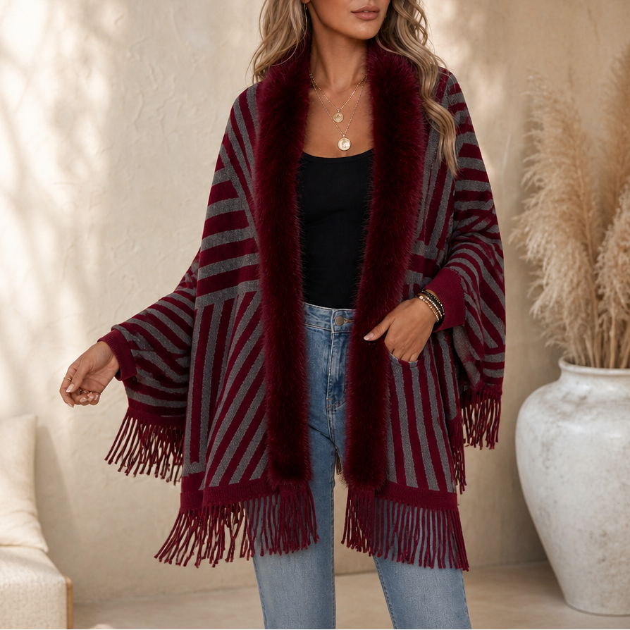 Styla din outfit med denna bekväma damponcho med fransar