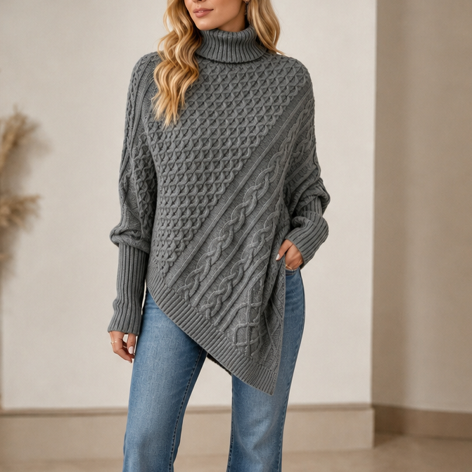 Exklusiv damponcho med polotröja i mjukt och värmande stickat garn.