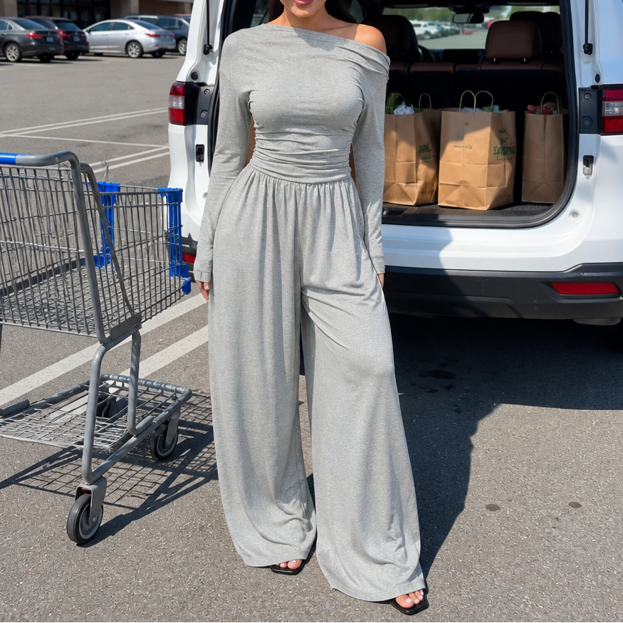 Fint fall på tyget i vida ben på damernas eleganta jumpsuit