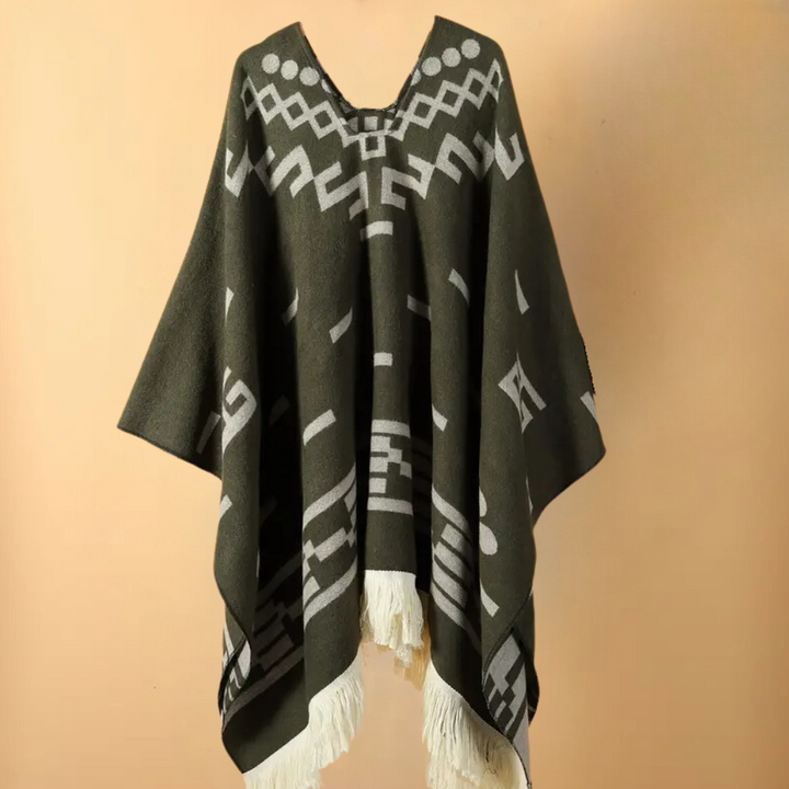 Mångsidig herrponcho för höstmode. Elegant överdrag som håller dig varm på kalla dagar. Stilren design.