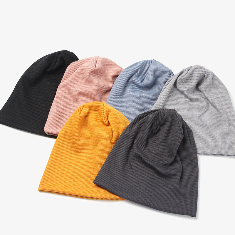 Varm unisex höstvintermössa i mjuk, vindtät fleece, kupoltopp, brättefri, orange färg, perfekt för höst och vinter.