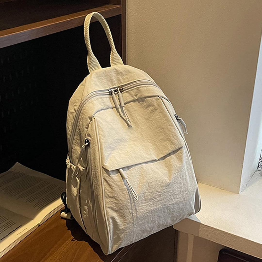 Robust Arvion vattentät ryggsäck i nylon, flera fack för dagligt bruk, pendling och äventyr.
