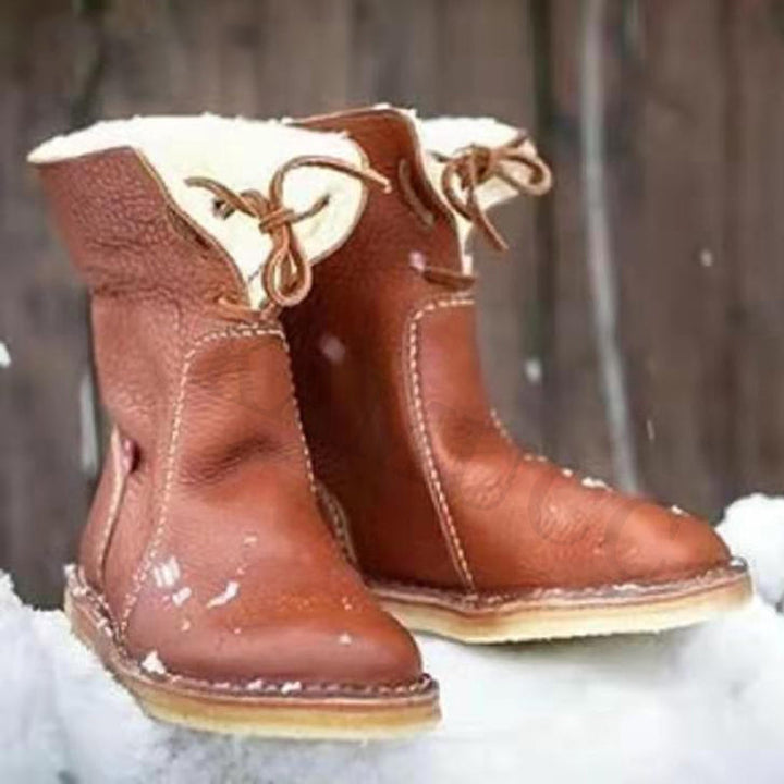 Vattentäta snöstövlar för dam i kaffe med plyschfoder och slitstark sula, perfekt för vinterdagar.