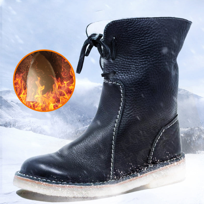 Detaljbild av dragkedjan på vattentäta snöstövlar för dam.
