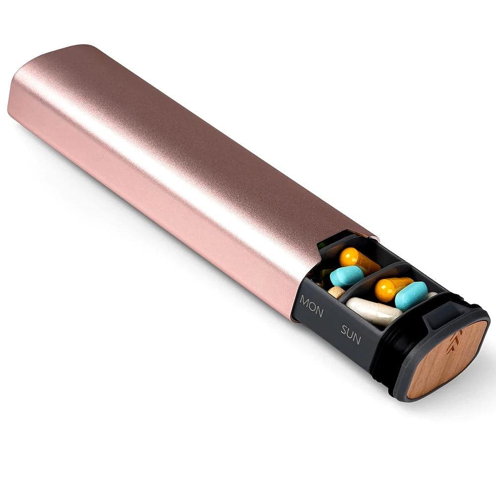 Rosa veckodosett i aluminium och trä med fack