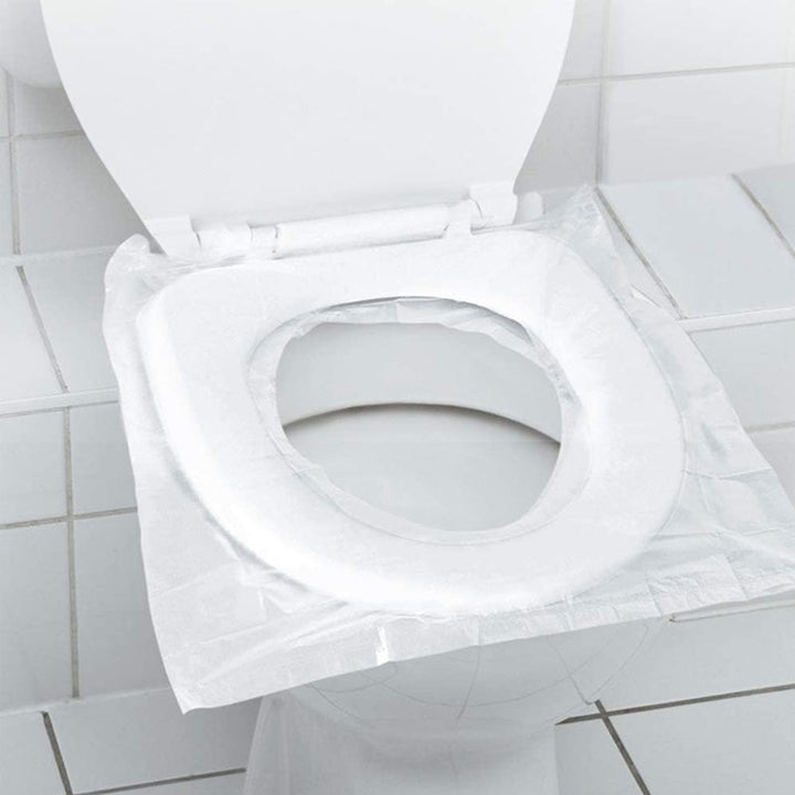 "Vikbart engångstoalettsits underlägg i vit färg, 40x48 cm, för hygien och komfort, idealiska för resor och hem"