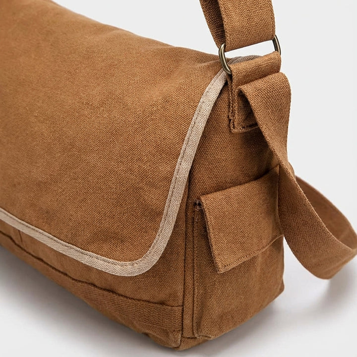 Slitstark vintage canvasväska i bomull, perfekt som axelväska för unisex. Mångsidig för resor & daglig användning.