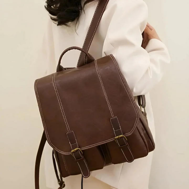 Funktionell unisex vintage ryggsäck för alla årstider. Rymlig modell, perfekt som skolväska eller resväska.