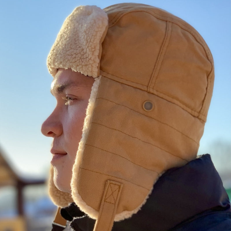 Vintermössa i fleece med öronvärmare för herr och dam, varm och trendig, finns i brun, grön, marinblå och svart.