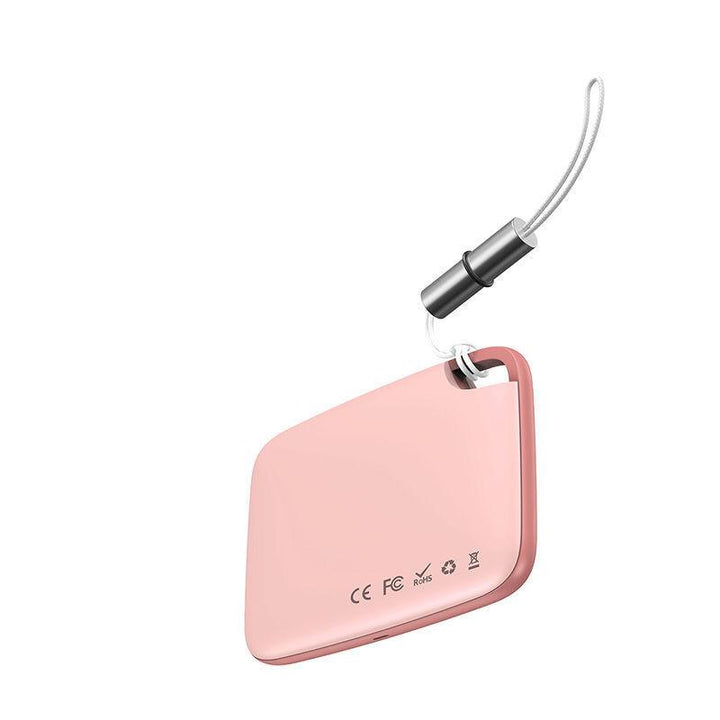 Smart Bluetooth-spårare i vit färg, kompakt och bärbar, idealisk för nycklar, husdjur och fordon.