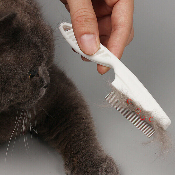 "Vit ergonomisk avtrasselgrooming kam för husdjur med rostfria rundade stift och bekvämt grepp för pälsskötsel."