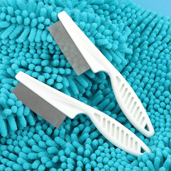 "Vit ergonomisk avtrasselgrooming kam för husdjur med rostfria rundade stift och bekvämt grepp för pälsskötsel."