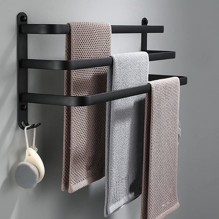 FlexRack väggmonterad handduksställ i svart aluminium med hängande handdukar