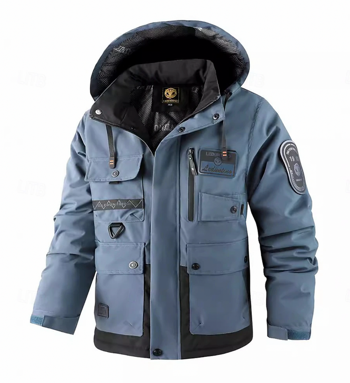 Blå vattentät parkas för män med detaljer och normal passform