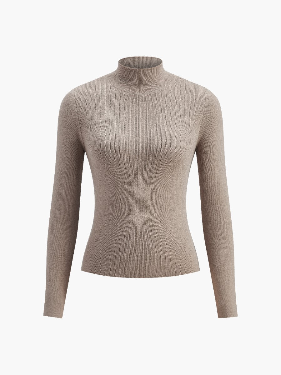 Beige damtröja med polokrage och elastisk ribbstickning i modern stil