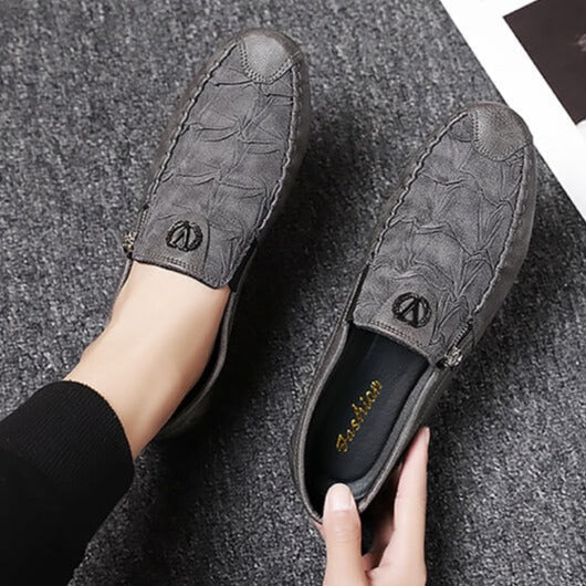 Andningsaktiva slip-on-skor för män