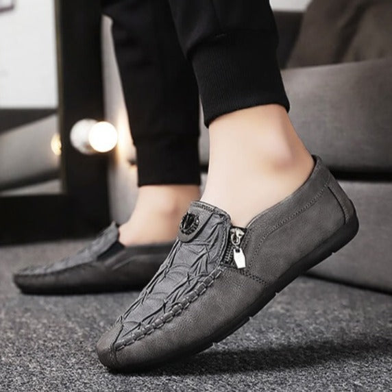 Andningsaktiva slip-on-skor för män