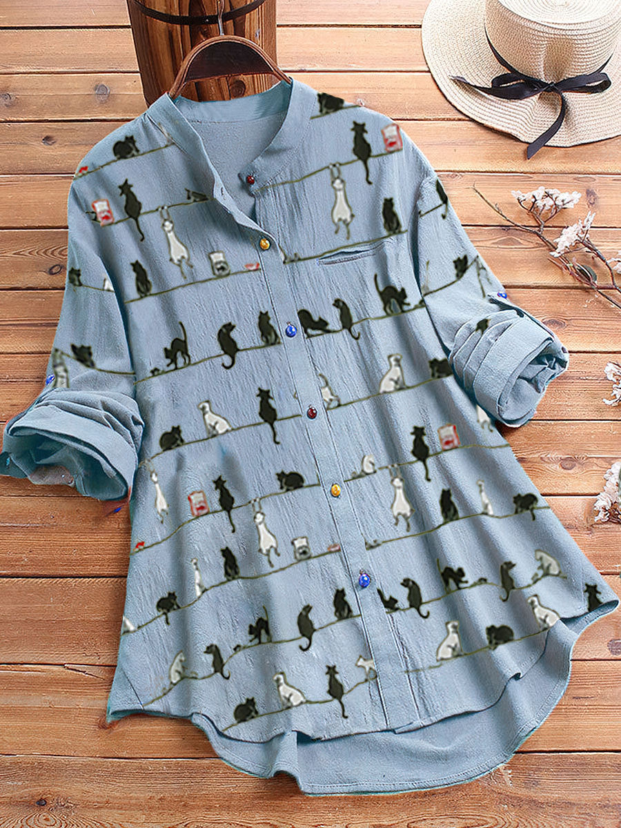 Blus med kattmotiv